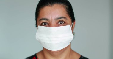 African american black woman putting on face mask prevention against Covid-19 epidemic outbreak