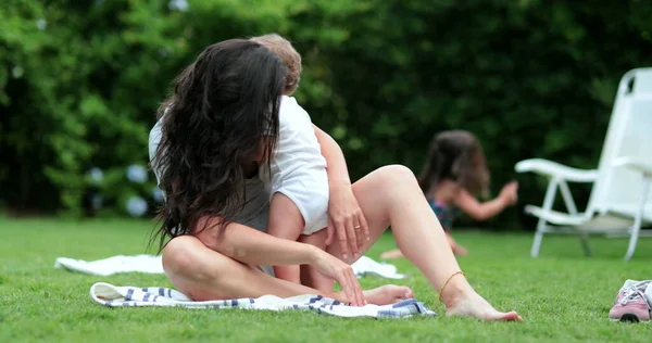 Candid Mother Caring Embracing Baby Infant Lawn — Stock Photo, Image
