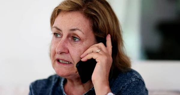 Older Woman 60S Speaking Phone — стоковое фото