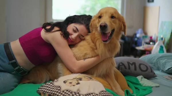 Loving Female Pet Owner Embracing Golden Retriever Indoors Home Apartment — Stock Photo, Image