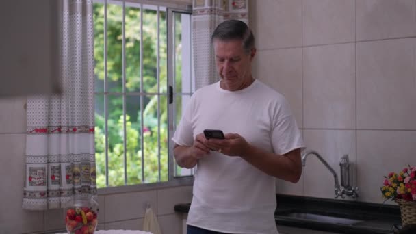One Middle Aged Man Looking Smartphone Device Screen While Standing — Stock Video
