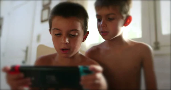 Two Siblings Sharing Video Game Screen Brother Playing Game Online — Stock Photo, Image