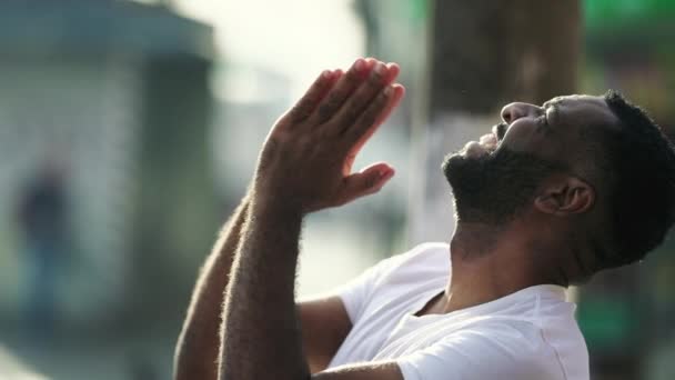 One Faithful Black Man Thanking God While Standing Urban Environment — Stock Video