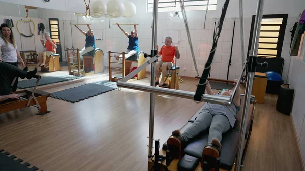 Group Elderly People Exercising Pilates Studio Old Age Workout Routine — Stock Photo, Image