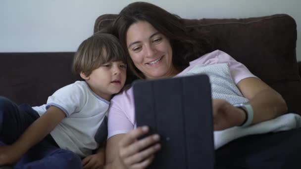 Happy Candid Mom Little Son Using Tablet Device Home Couch — Stock Video