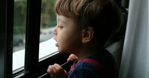 Kid Standing Window Looking Child Stares Out Leaning Window — Stock Photo, Image
