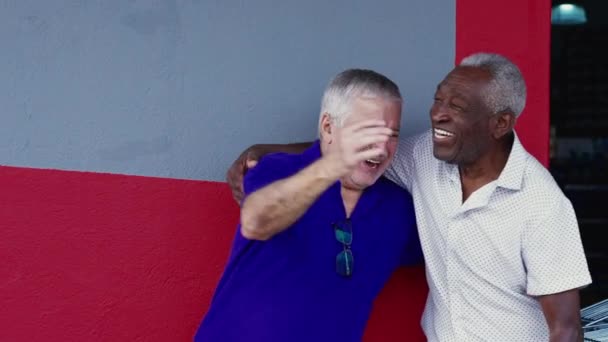 Authentic Interaction Two Happy Diverse Older Friends Hugging Celebrating High — Vídeo de Stock