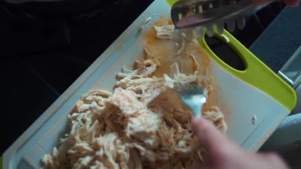 Hand Shredding Chicken Fork Close View Pulling Apart Chicken Pieces — Stock Video