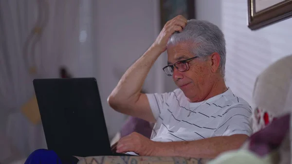 Concerned Senior Man Front Laptop Computer Preoccupied Frustrated Expression Gray — Stock Photo, Image