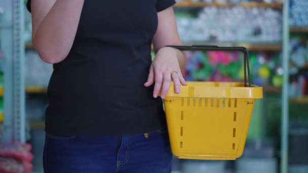 Female Shopper Holding Grocery Basket Hand Detail Close Consumerism Lifestyle — Stock Video