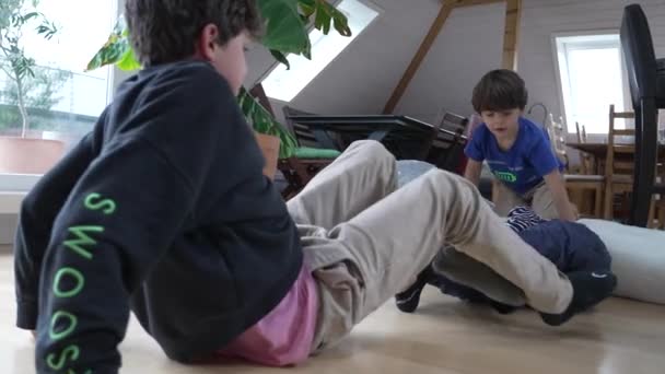 Indoor Sibling Clash Scene Brothers Wrestling Arguing Floor Family Feud — Stock Video