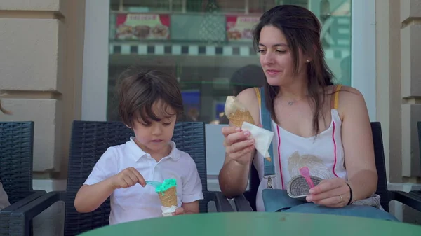 Mom Offers Son a Taste of Her Ice-Cream Cone on Summer Day