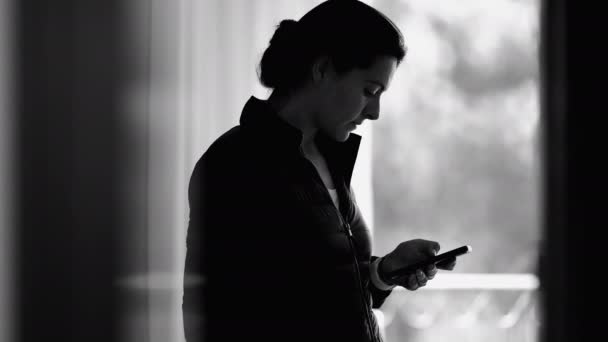 Monochromatic Scene Woman Using Smartphone Device Browsing Internet Cellphone Person — Stock Video