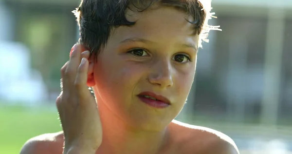 Boy Scratching Ear Casually Portrait Kid Scratches Body Itching Child — Stok fotoğraf