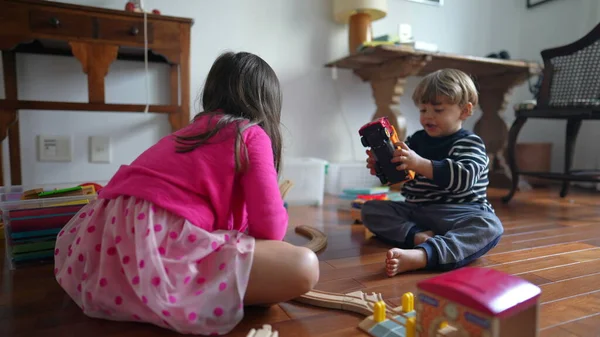 Siblings Engrossed Play Little Boy Girl Sharing Toys Home Floor — Stock Photo, Image