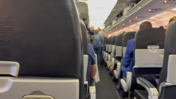 Plane Corridor Aisle Cabin Passengers Boarding Airplane Traveling Flight Concept — Stockvideo