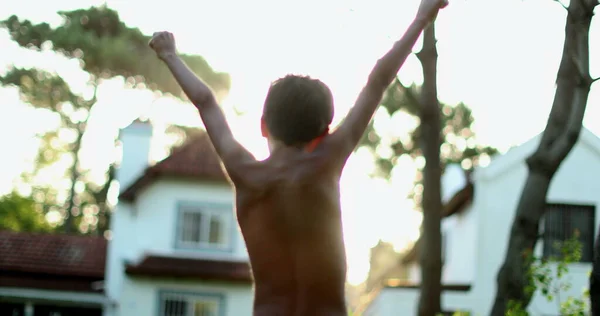 Confident Child Celebrating Success Raising Fists Air Boy Raises Arms — ストック写真