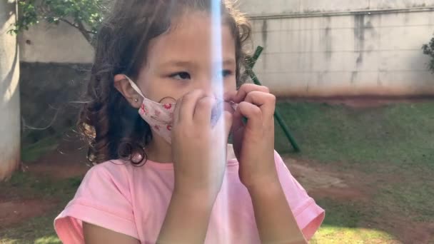 Child Wearing Face Mask Standing Outdoors Park — Videoclip de stoc