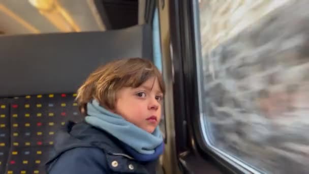 Lindo Chico Sentado Tren — Vídeos de Stock