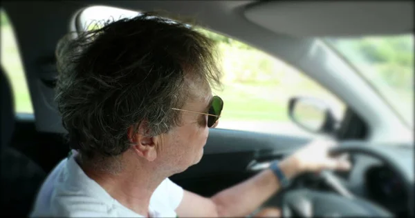 Older Man 70S Holding Steering Wheel Driving Countryside Road — Stok Foto