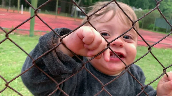 Baby Infant Holding Fence Watching Game — Stock Photo, Image