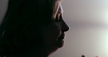 Depressed senior woman suffering in silence. Close-up toruble person face