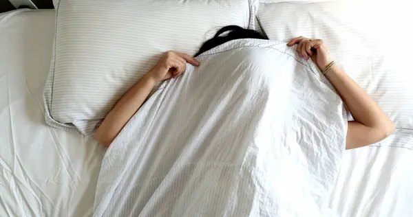 Fun Young Woman Playing Peekaboo Bed Blanket Girl Gide Seek — Zdjęcie stockowe