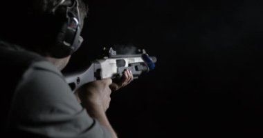 Man Fire Shotgun 800fps Super Slow-Motion, High-Speed Shooting from Behind