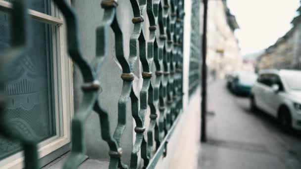 Protective Metal Window Fence Patterns Defend Intruders Building Facade Sidewalk — Stock Video