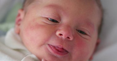 Closeup of infant newborn baby