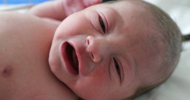 Infant newborn baby boy crying