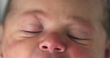 Macro closeup of newborn baby