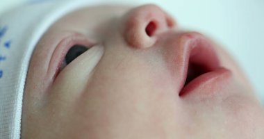 Newborn baby close-up of face