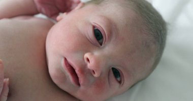 Newborn baby boy at hospital first day of life