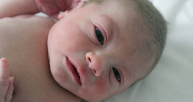 Newborn baby boy at hospital first day of life