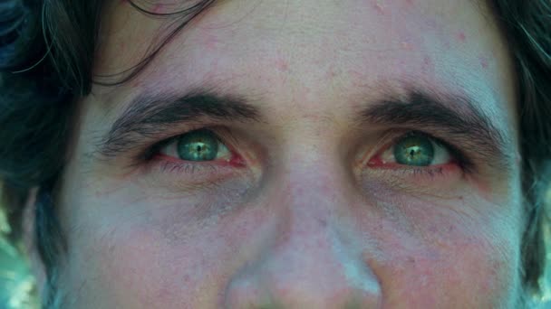 Young Man Closeup Green Eyes Neutral Expression Natural Emotion Male — Stock Video