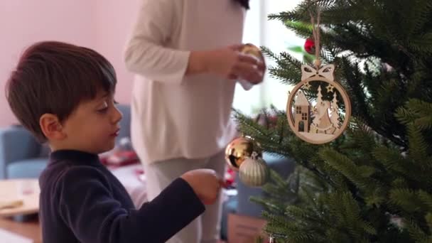 Mother Child Decorating Christmas Tree Balls Ornaments Family Preparing Winter — Stock Video