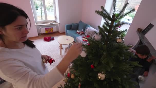 Mother Child Decorating Christmas Tree Winter Season Holidays Family Preparing — Stock Video