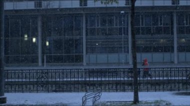 Falling snow in city urban environment in super slow motion at 1000 fps captured with a high speed camera