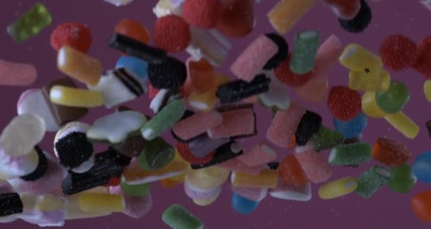 Macro View Colorful Candy Assortment Flying Falling Super Slow Motion — Stockvideo