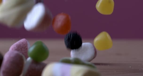 Macro View Sugary Candies Falling Super Slow Motion — Stockvideo