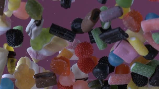 Colorful Candy Assortment Flying Air Super Slow Motion 1000 Fps — Stock Video