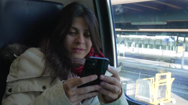 Happy Woman Receiving Positive Notification Message Cellphone While Sitting Train — Vídeo de stock