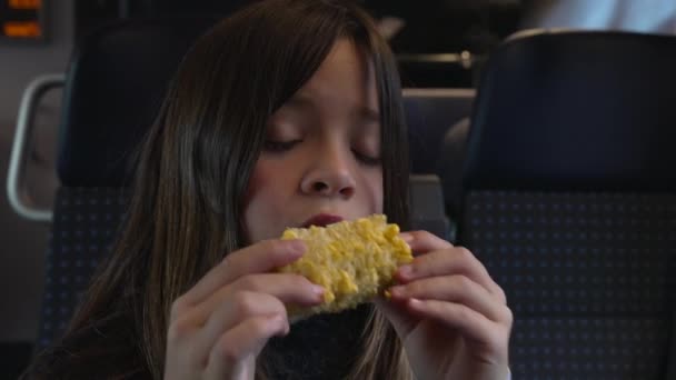 Portrait Little Girl Eating Corn While Moving Train Child Snacking — Vídeo de stock