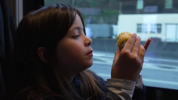 One Small Girl Eating Corn While Moving Train Child Snacking — Stok video