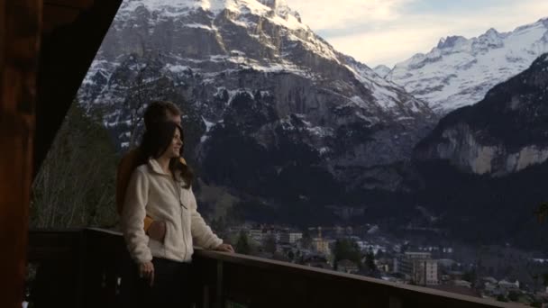 Couple Enjoying Mountain View Standing Chalet Balcony Switzerland People Vacationing — 图库视频影像