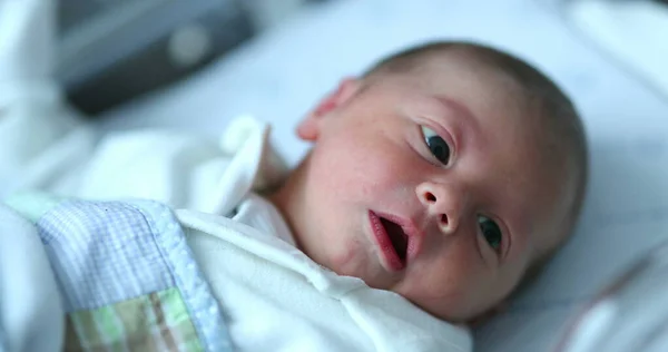 Newborn baby at hospital nursery after birth