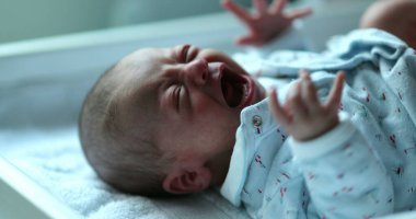Infant newborn baby crying during first week of life