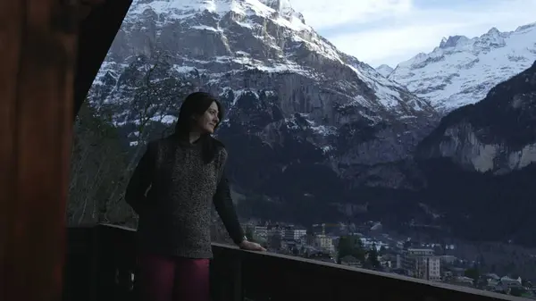 Absorbed Nature Woman Contemplating Swiss Alps Winter Stockfoto