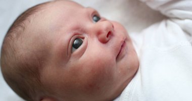 Adorable cute newborn baby infant closeup